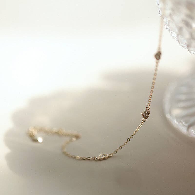 Dainty Gold Triple Heart Bracelet