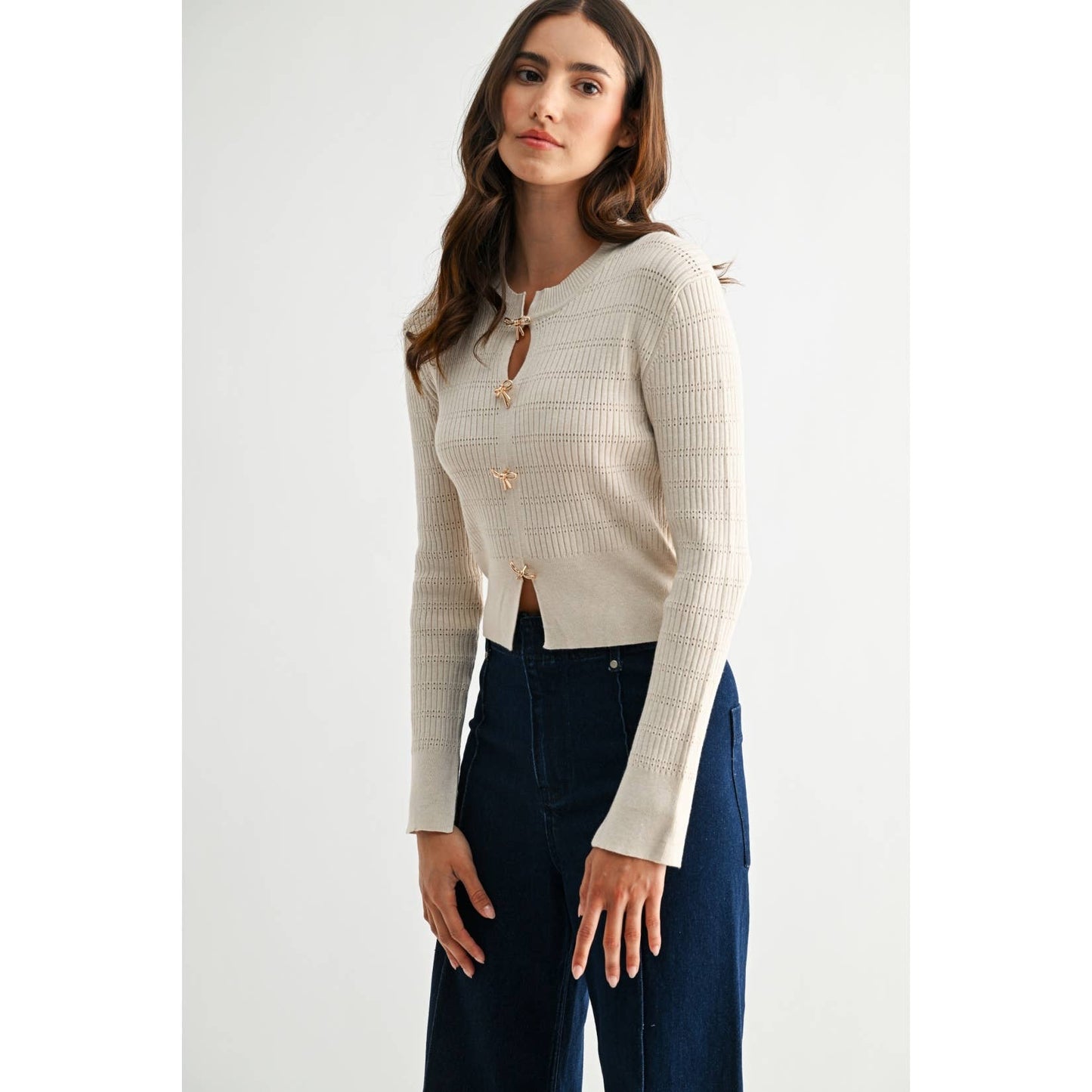 IVORY RIBBED CARDIGAN WITH METALLIC ACCENTS