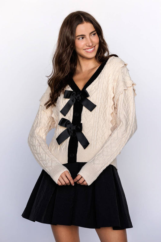 CABLE KNIT CARDIGAN WITH BOWS